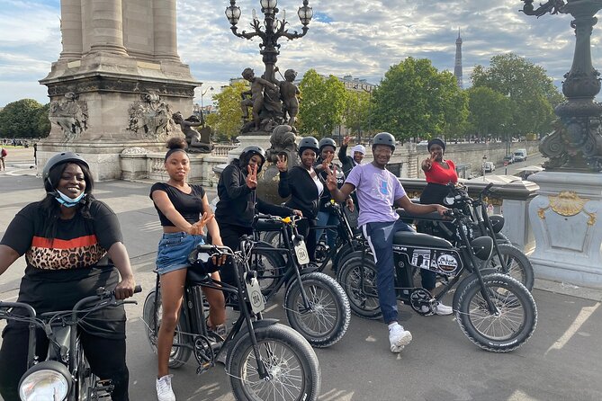Paris Sightseeing Family Friendly Guided Electric Bike Tour - Flamme de la Liberté, Grand Palais, and Invalides finish: Paris beyond the postcard