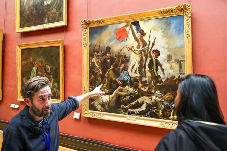 Paris: Skip-the-Line Louvre Museum & Mona Lisa Guided Tour - Entering the Louvre Pyramid with less waiting drama