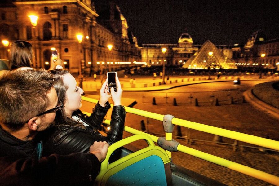 Paris: Tootbus Open-Top Christmas Bus Tour - Getting ready for the ride: seats, earphones, Wi-Fi, and staying warm