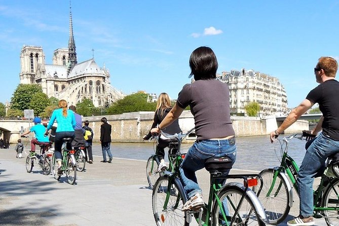 The Paris Monuments Tour - Stop 6: Eiffel Tower glide after a snack break on Rue Cler