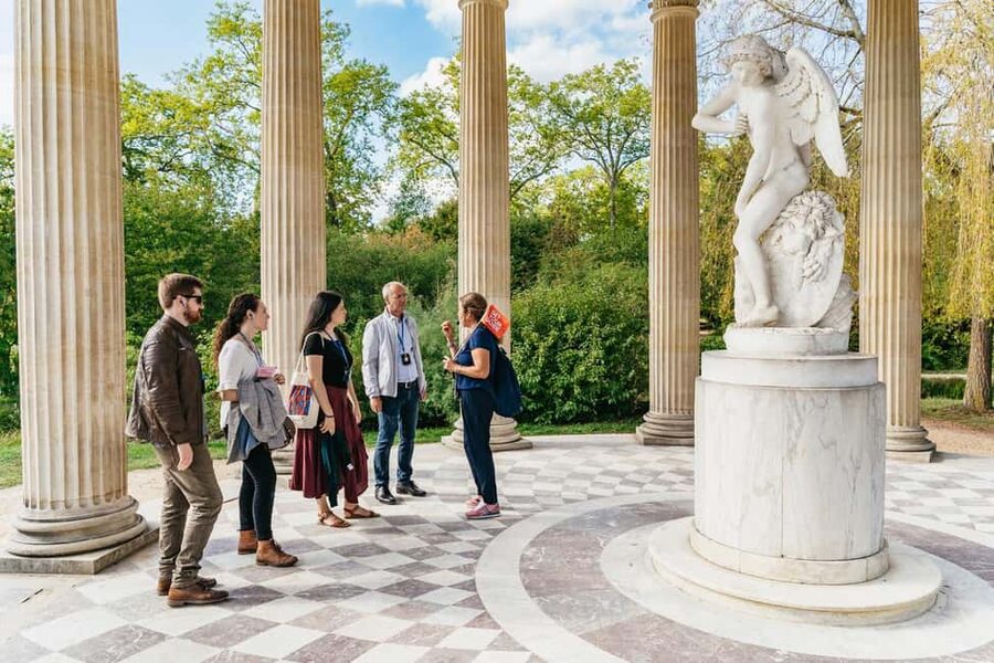 Versailles: Palace, Gardens & Queen’s Estate Guided Tour - Skip-the-line entry and a realistic meeting point in Versailles